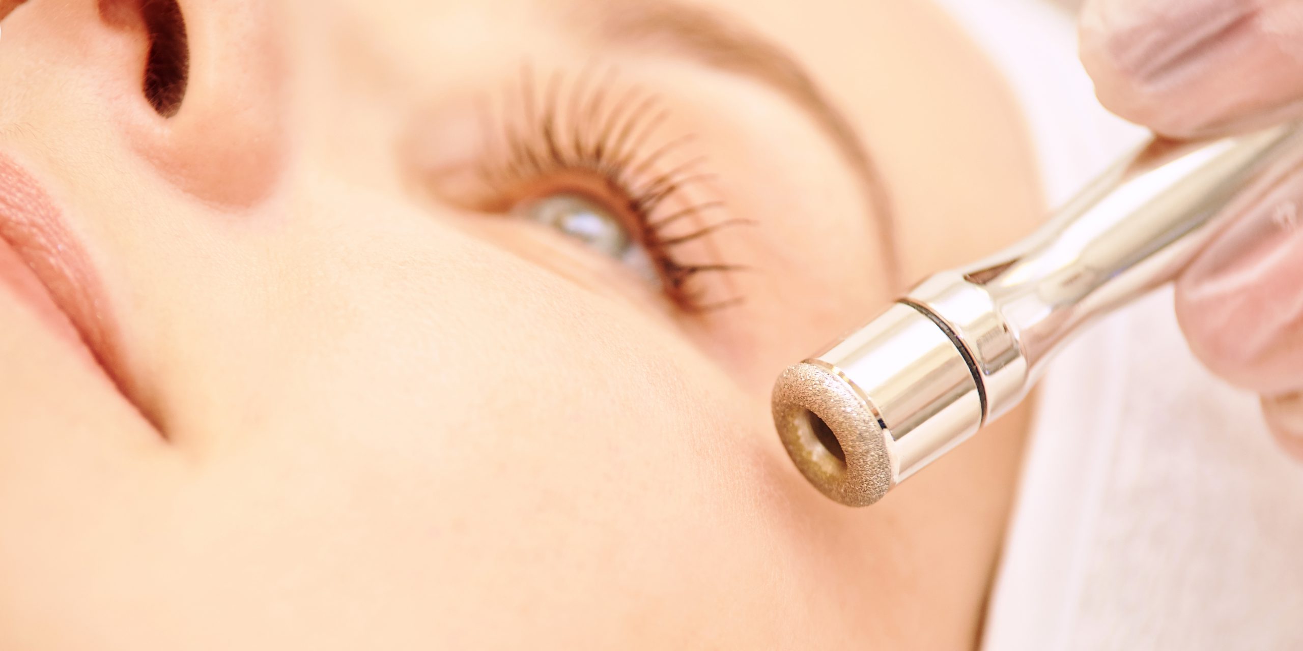 Woman receiving diamond microdermabrasion treatment at Sedora Spa